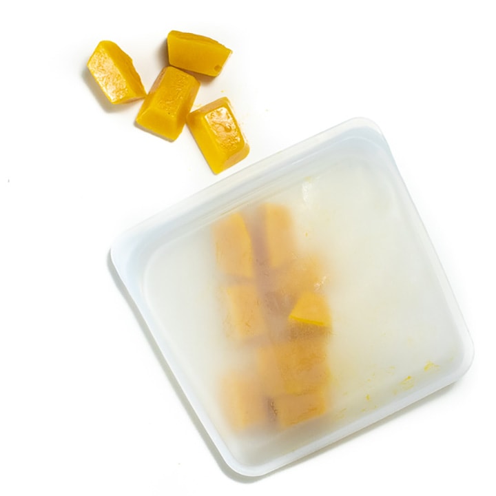 Stasher bag full of frozen pumpkin cubes.