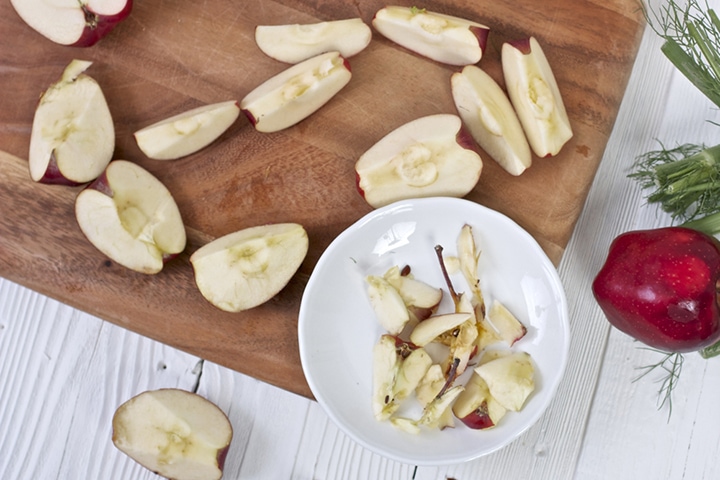 Produce spread around a cutting board.
