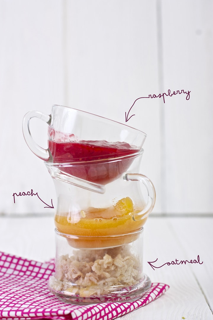 Image is of stacked cups with the purees and oats inside.