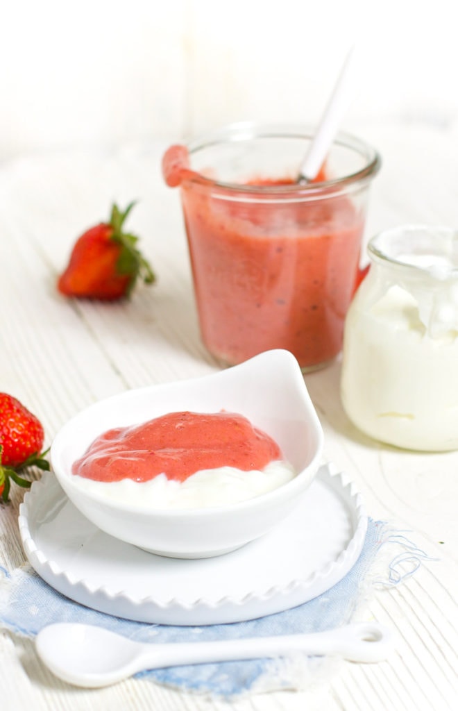 Small white bowl filled with homemade baby food puree and yogurt.