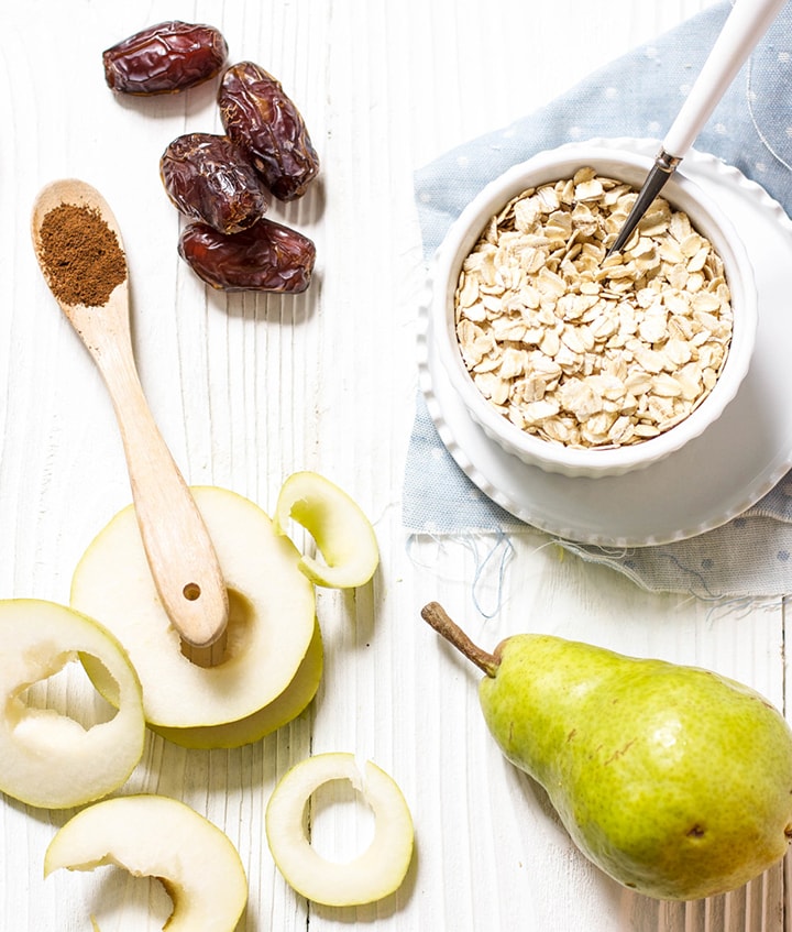 spread on a white wooden board of all the produce in this recipe.