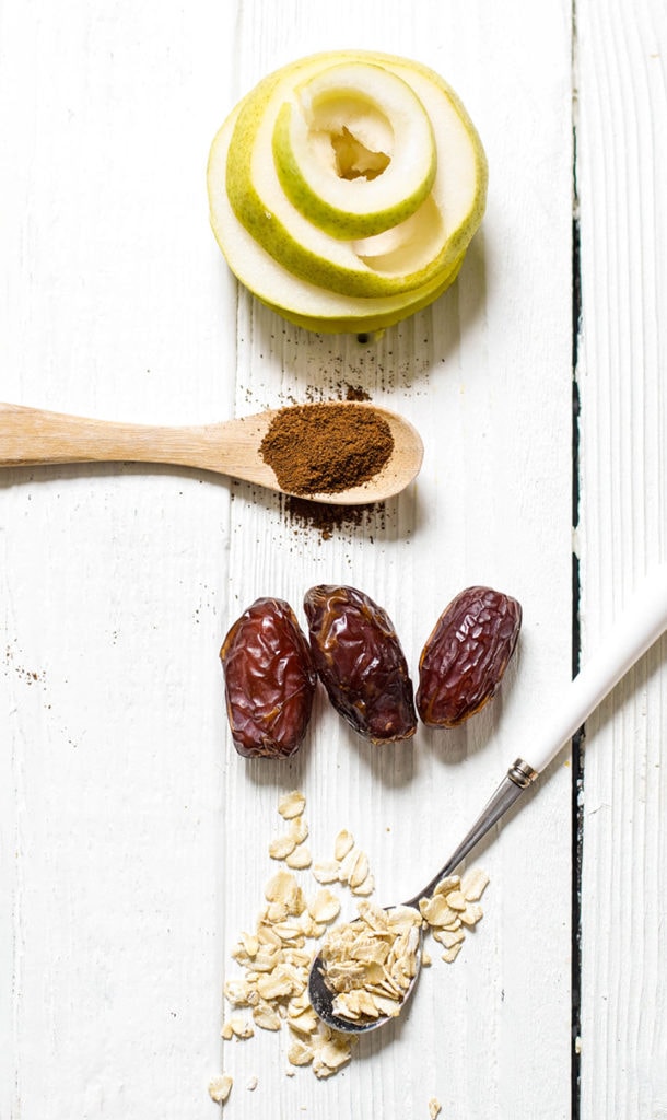 spread on a white wooden board of all the produce in this recipe.