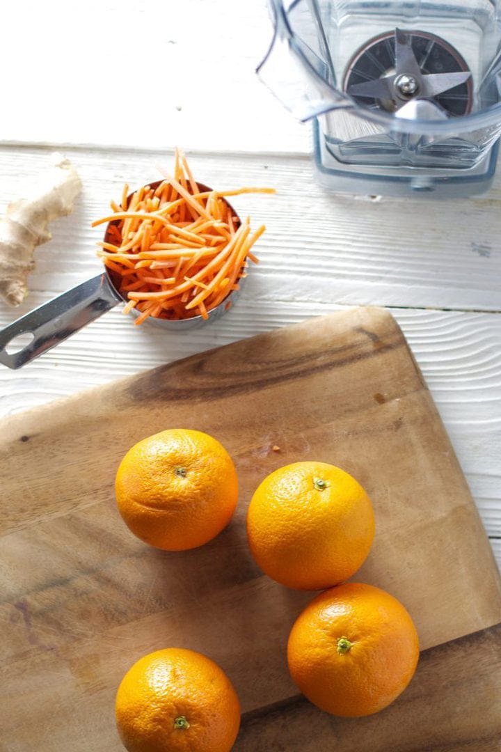 spread of ingredients for carrot orange juice.