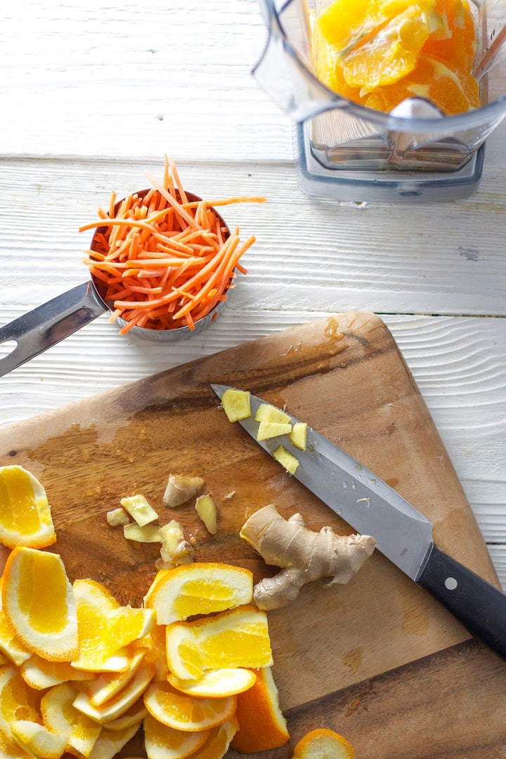 spread of ingredients for carrot orange juice.