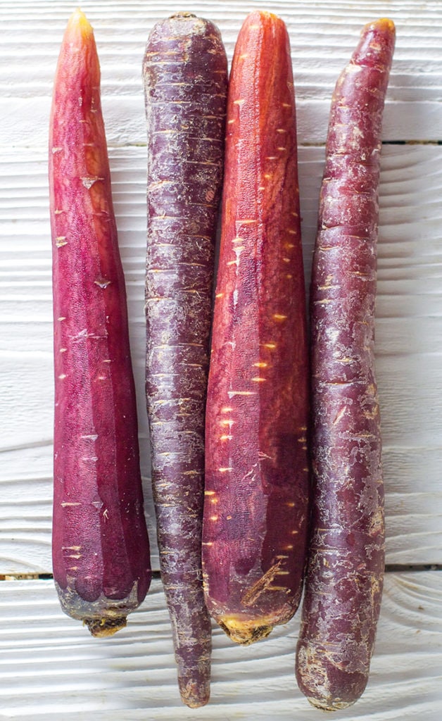 4 Purple carrots.