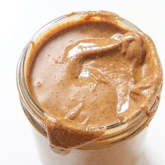 Almond vanilla butter in a glass jar.