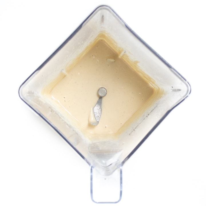 Blender full of pureed chicken for baby.