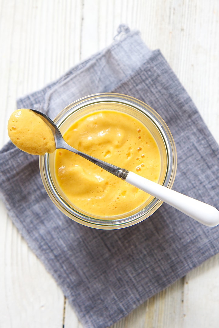 Small bowl filled with creamy Thai chicken baby food puree.