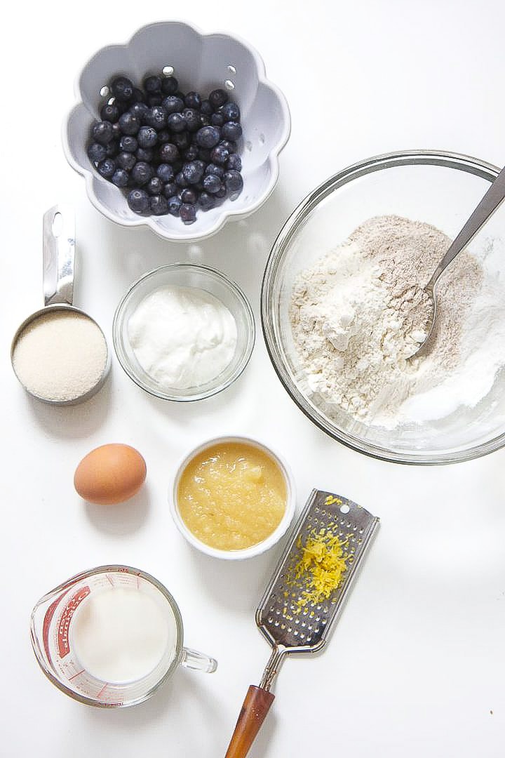 Ingredients spread out for toddler blueberry muffins.