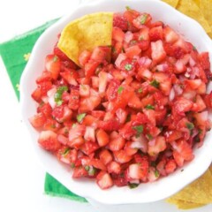Strawberry salsa in a white bowl.