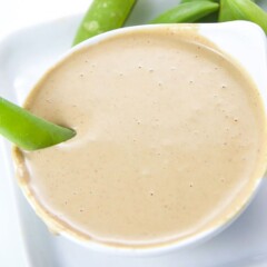 Yogurt dip in a white bowl.