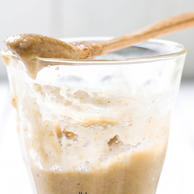 Side shoot of a clear jar and a baby food puree for baby breakfast idea.