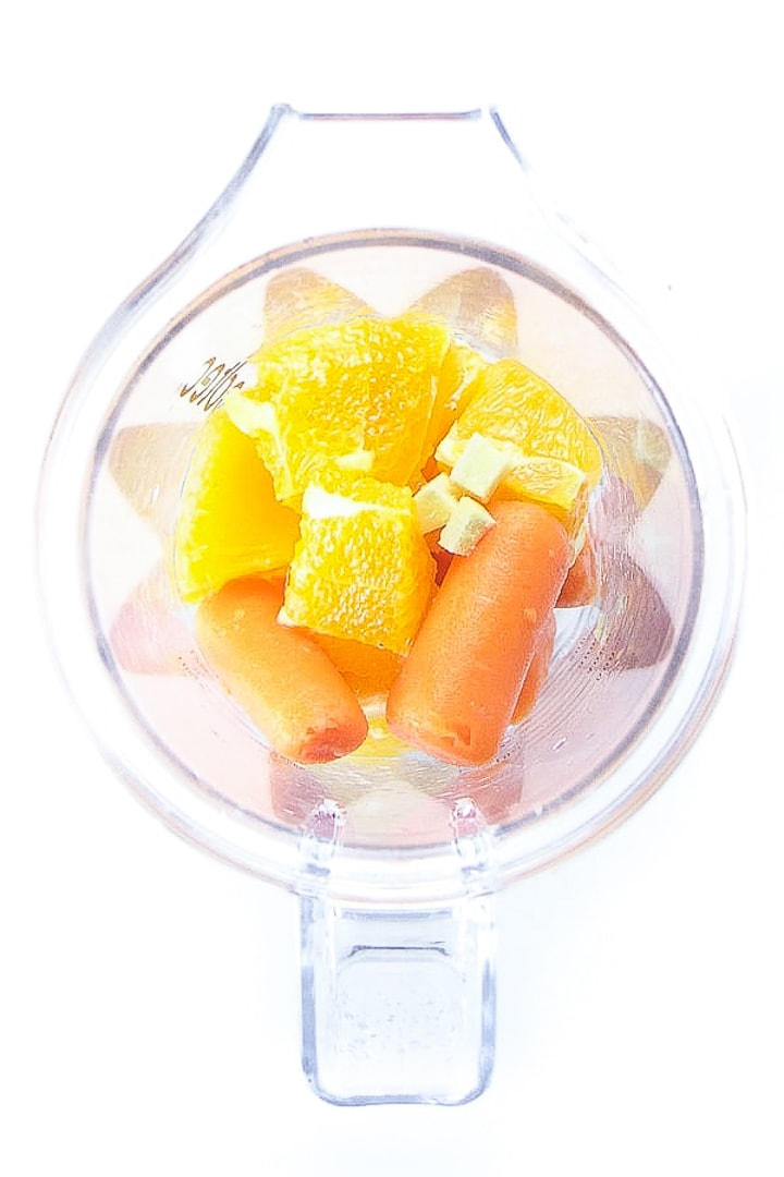 Blender full of ingredients for baby and toddler homemade popsicles.