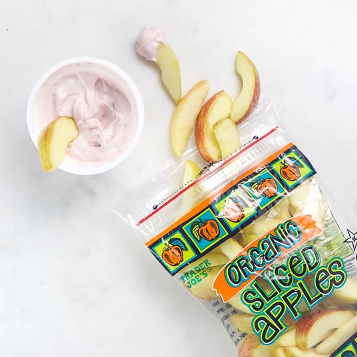 sliced apples and yogurt for toddler snack.
