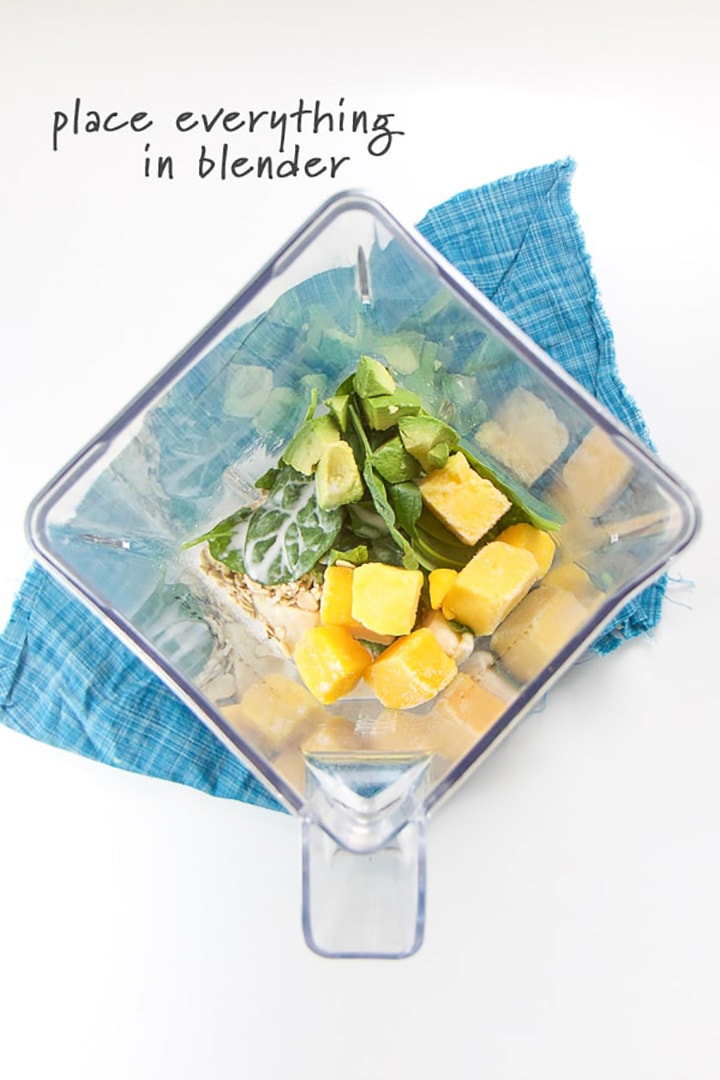 Blender full of healthy ingredients for baby smoothie