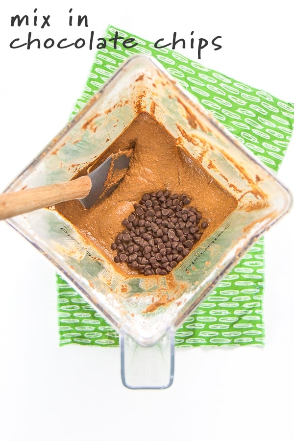 blender with batter and chocolate chips for pumpkin chocolate muffins