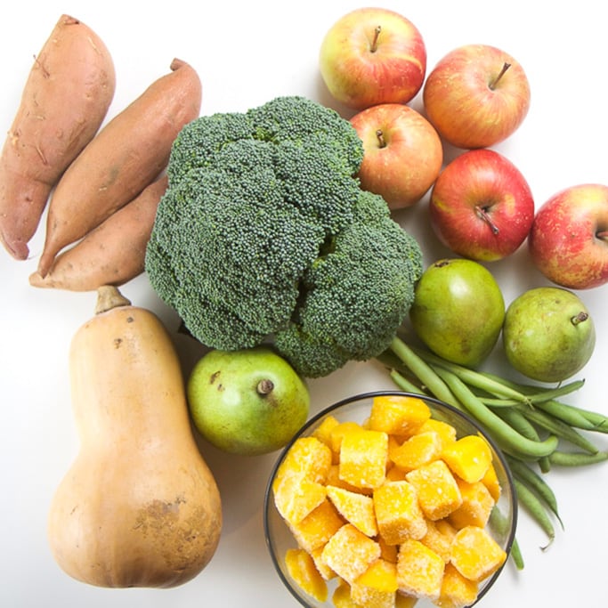group of produce for the 7 organic baby food recipes in this post- sweet potato, broccoli, apples, pears, green beans, butternut squash and frozen mangos.