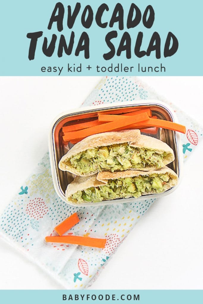 graphic for post - text reads Avocado Tuna Salad - easy kid + toddler lunch. image is of a white bento box is filled with a mini pita pocket cut in half and filled with an avocado tuna salad, there are cut sticks of carrots on the plate as well. The plate is sitting on a multi-colored napkin on a white surface.