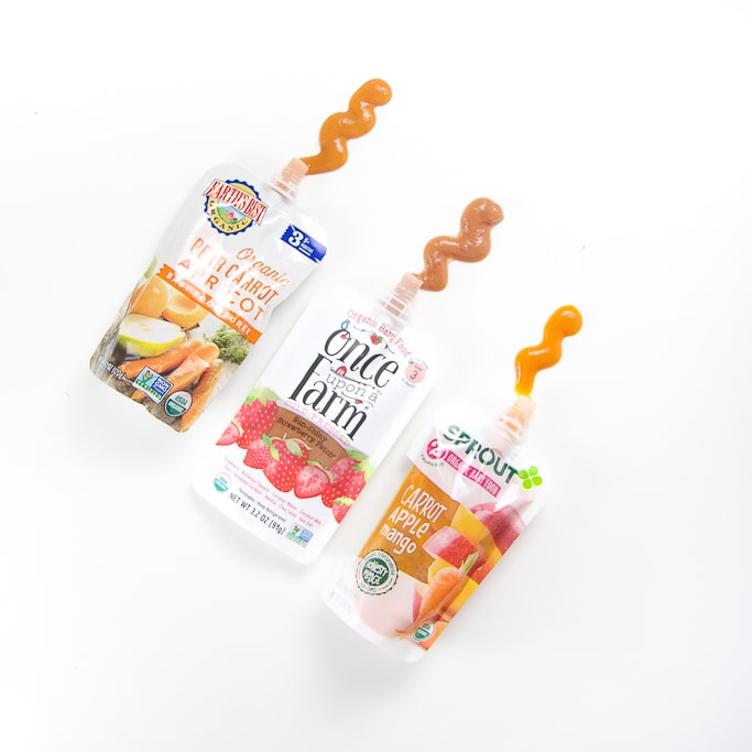 3 pouches will their purees squeezed out - review of which one is the best