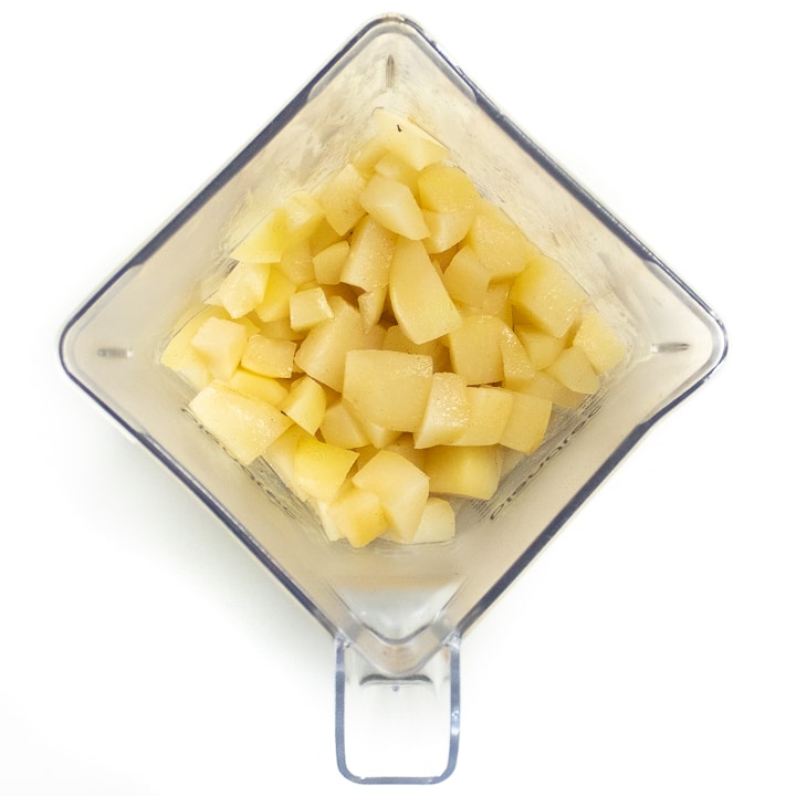 Blender full of cooked pears.
