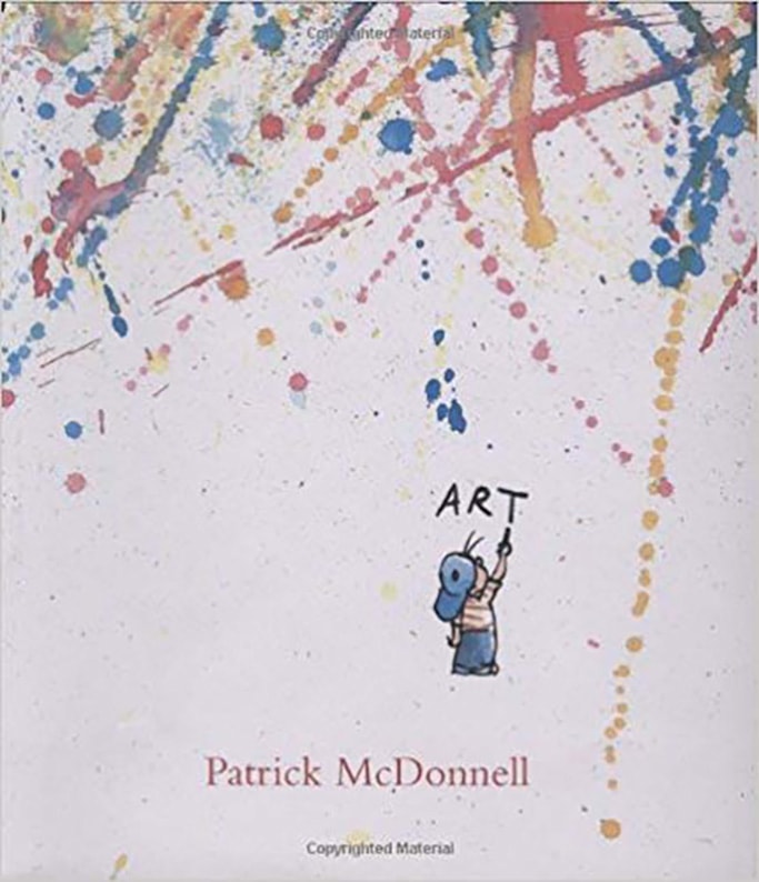 A book cover called Art, with splatters of paint on it.