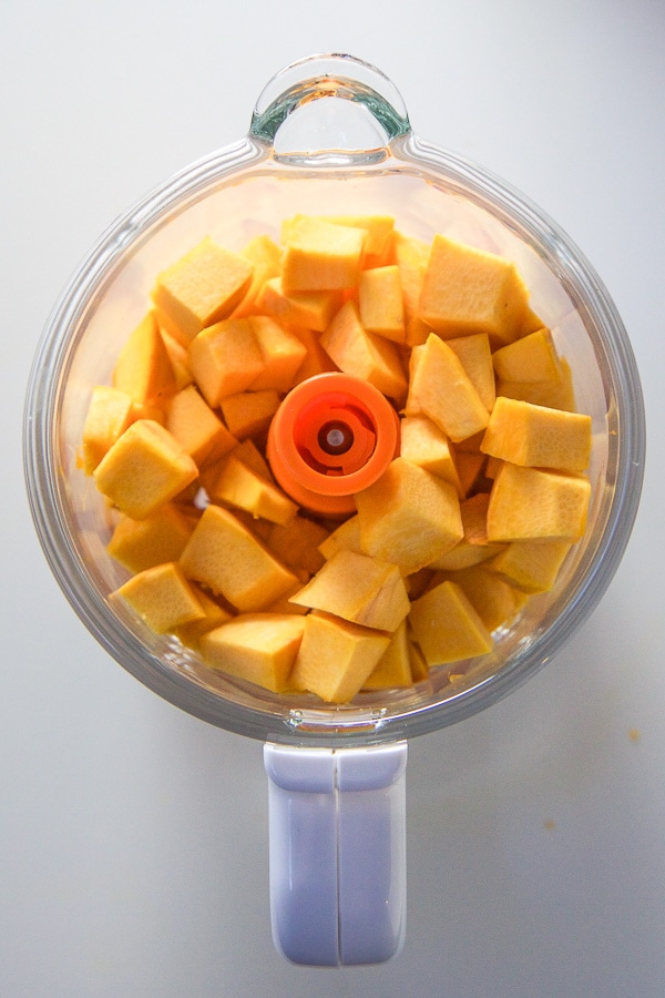 chopped pumpkin inside a baby food machine.