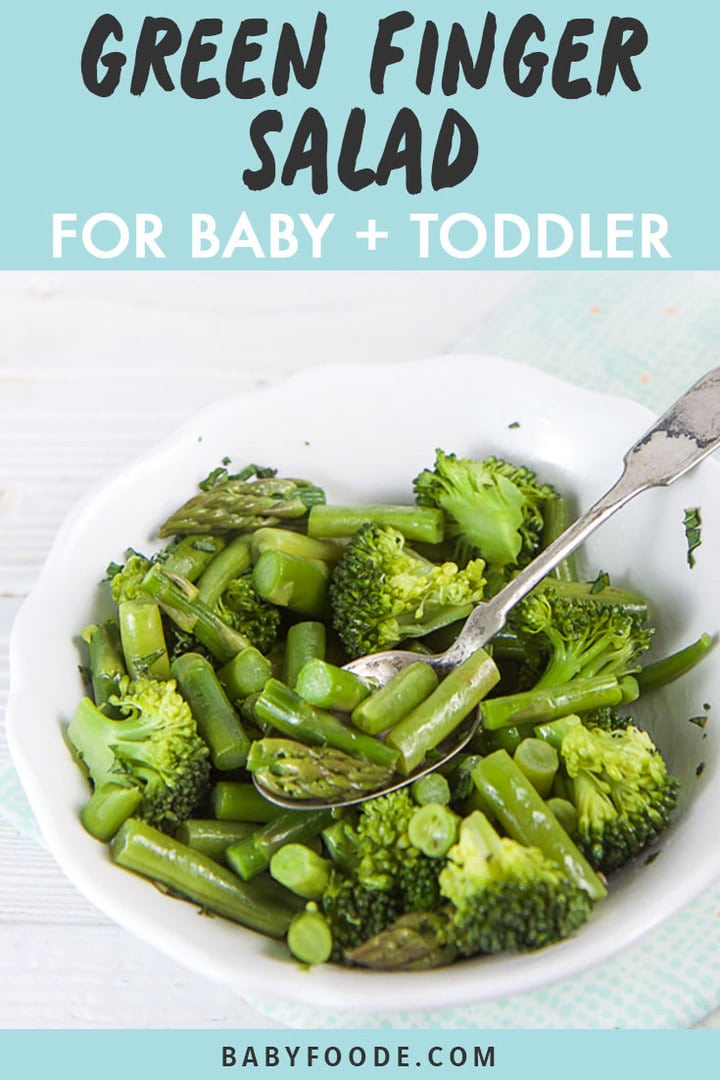 Graphic for Post - Green Finger Salad for Baby + Toddler. Image is of a White bowl filled with green veggies for finger foods or baby-led weaning.