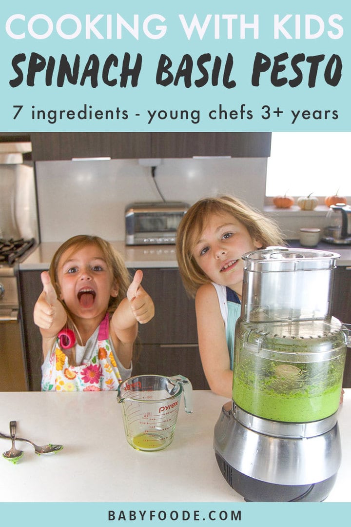 Graphic for post - Cooking with Kids - Spinach Basil Pesto - 7 ingredients - young chefs 3+ years. Image is of two girls in a kitchen, one make in the thumbs up sign.