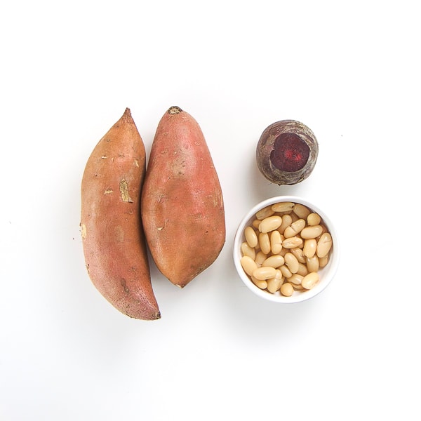 Produce lined up on a white background.
