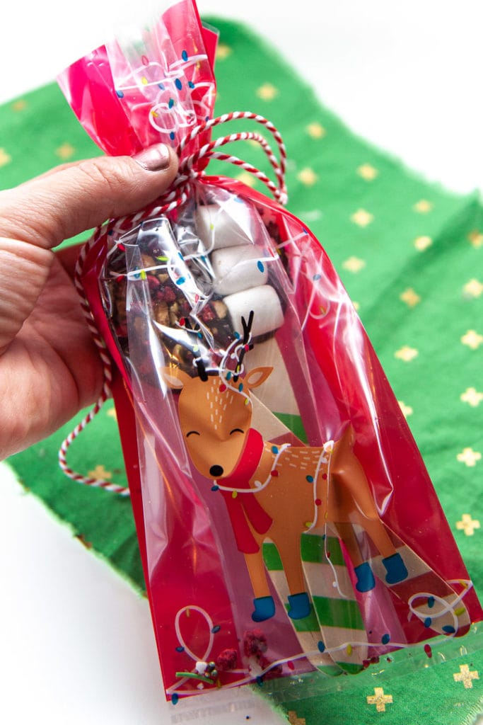 bag filled with chocolate stirring spoons.
