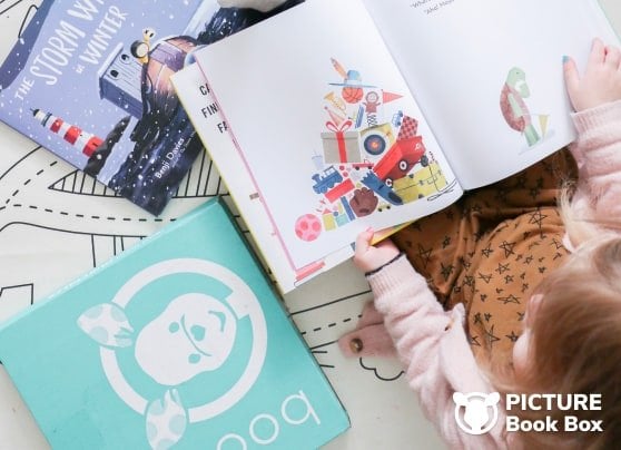 Little hands reading board books.