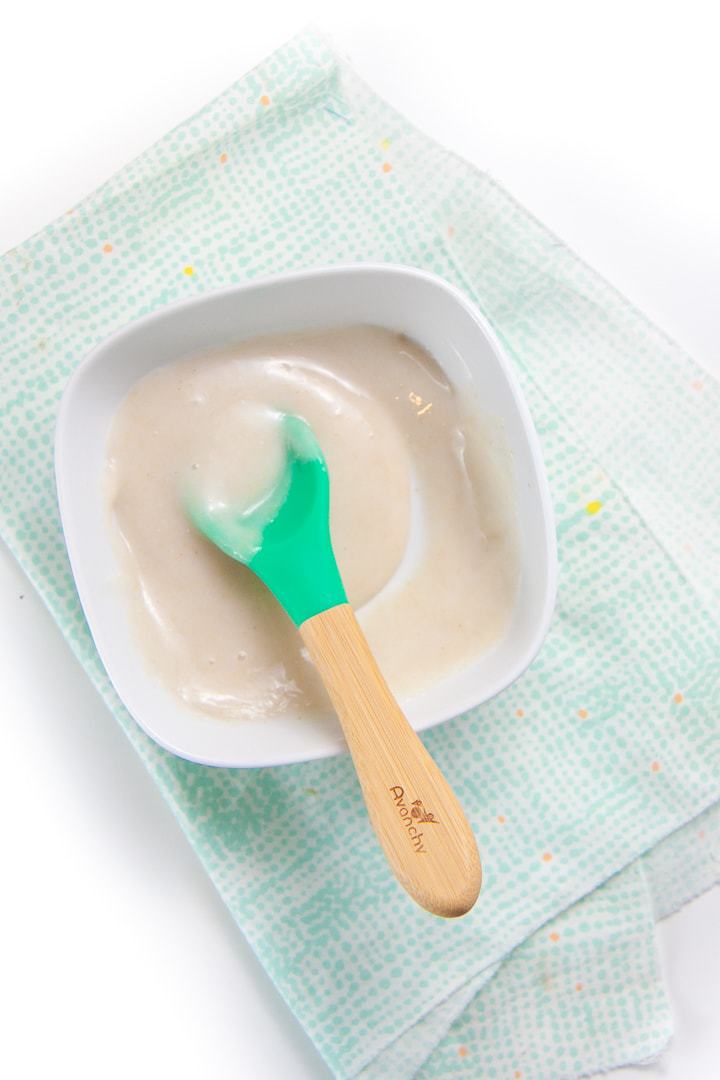 Rice baby cereal in a white bowl - easy and homemade.