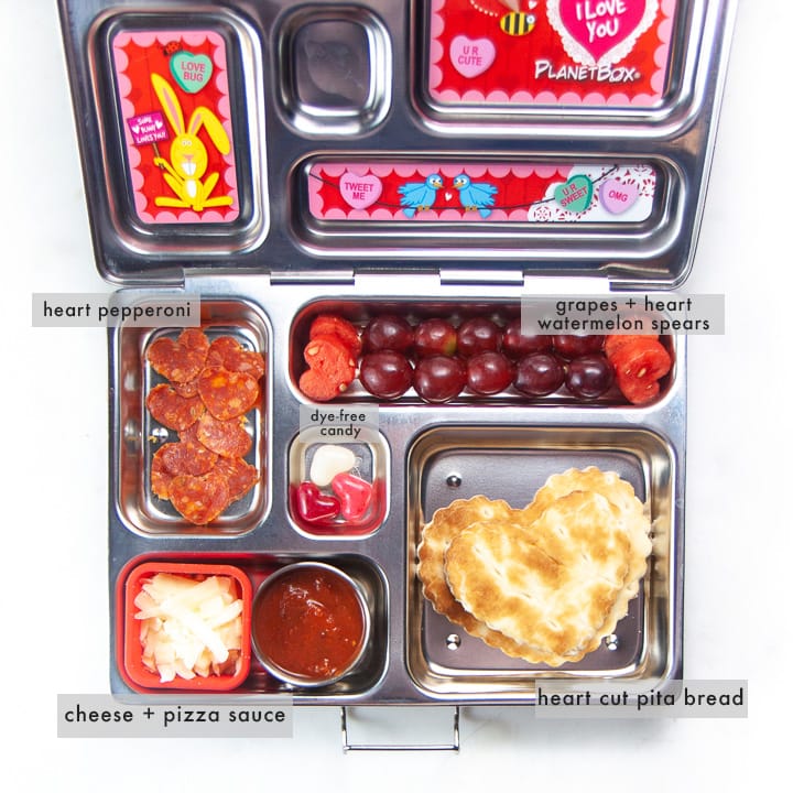 School lunch box with healthy diy heart pizza punchable with all foods labeled.