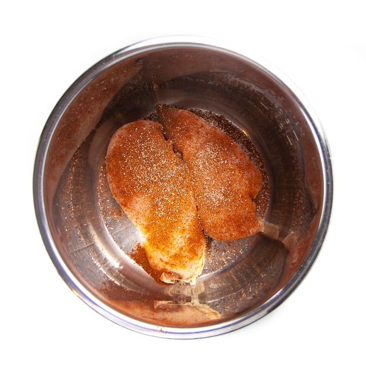 chicken with spices onto.