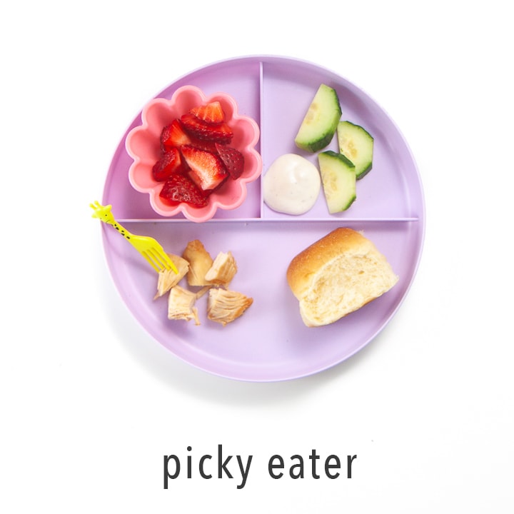 Purple plate filled with bbq chicken meal for dinner.
