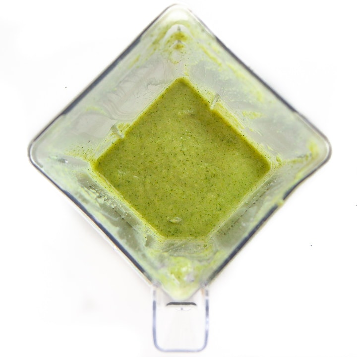 blender full of baby food puree for a meal for baby.