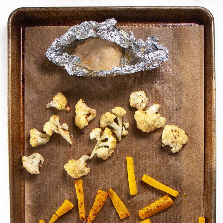 sheet pan with roasted food for baby.