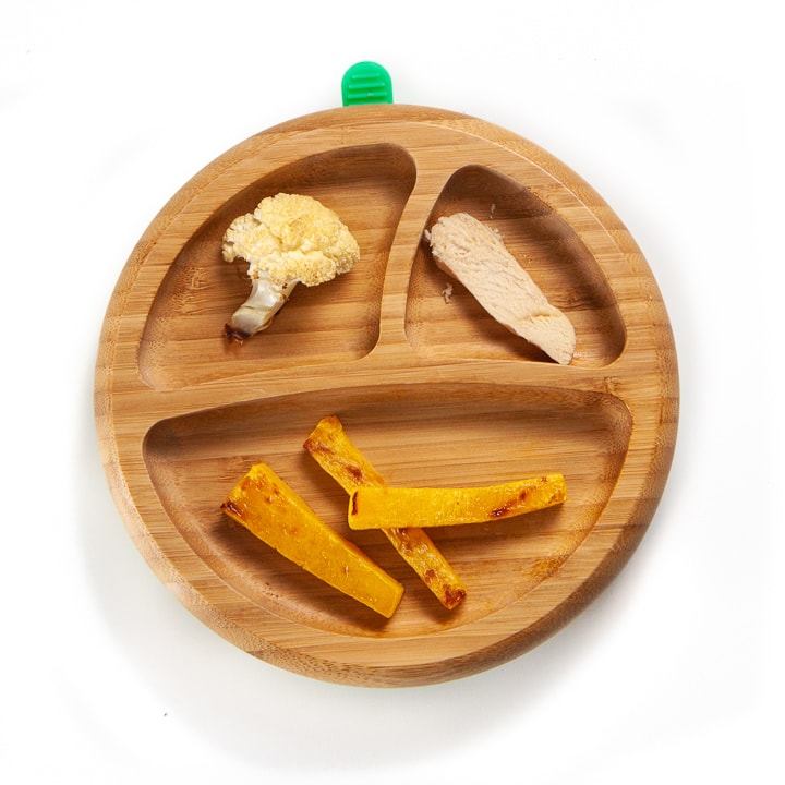 plate filled with squash, cauliflower and chicken for baby in finger foods.