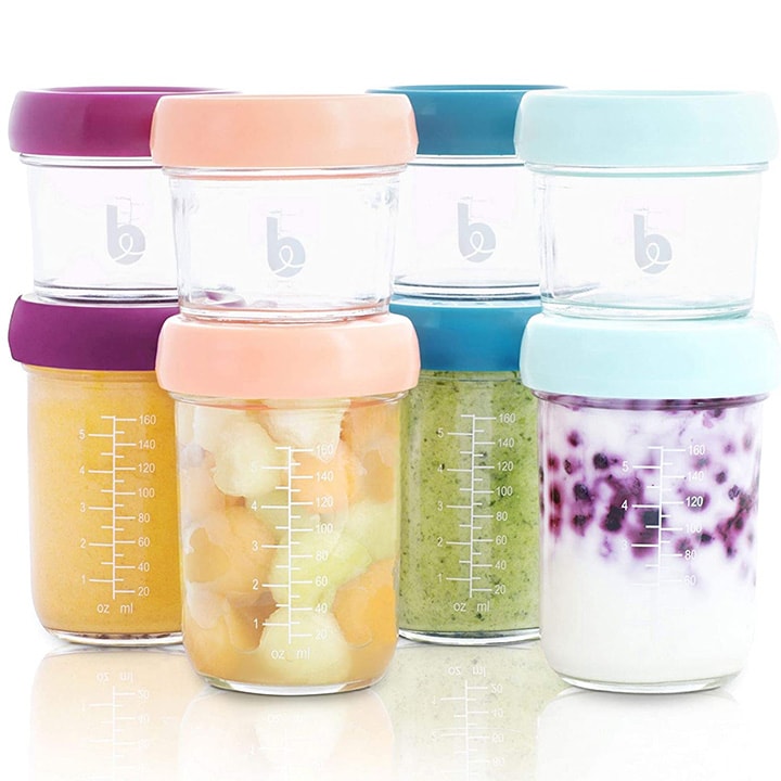 Set of 8 glass jars for storing baby food purees.