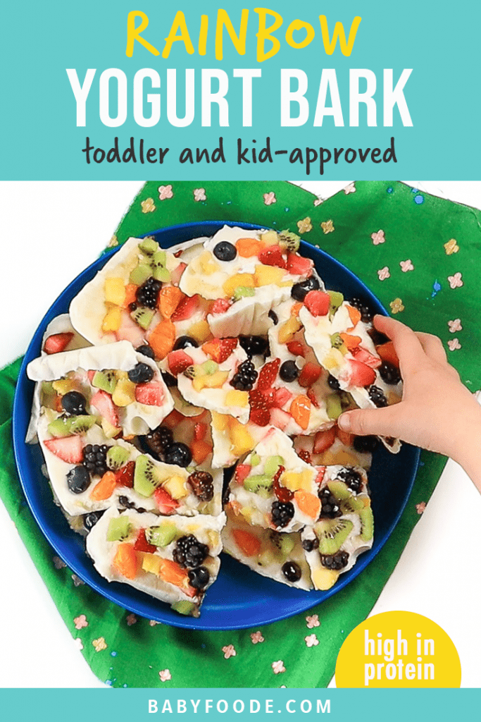 Graphic for post - rainbow frozen yogurt bark - toddler and kid favorite - high in protein. Image is of kids hand reaching into a pile of frozen yogurt bark.