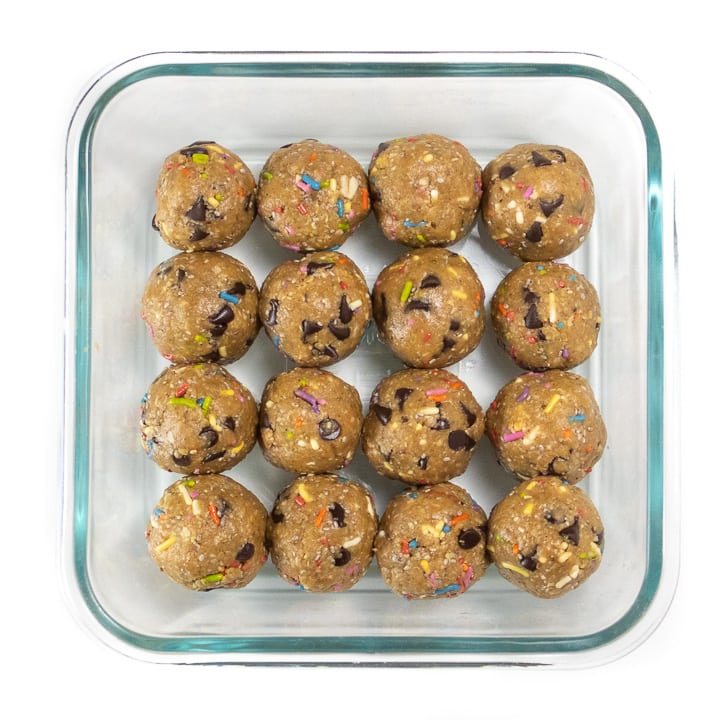 funfetti energy balls in a storage container.
