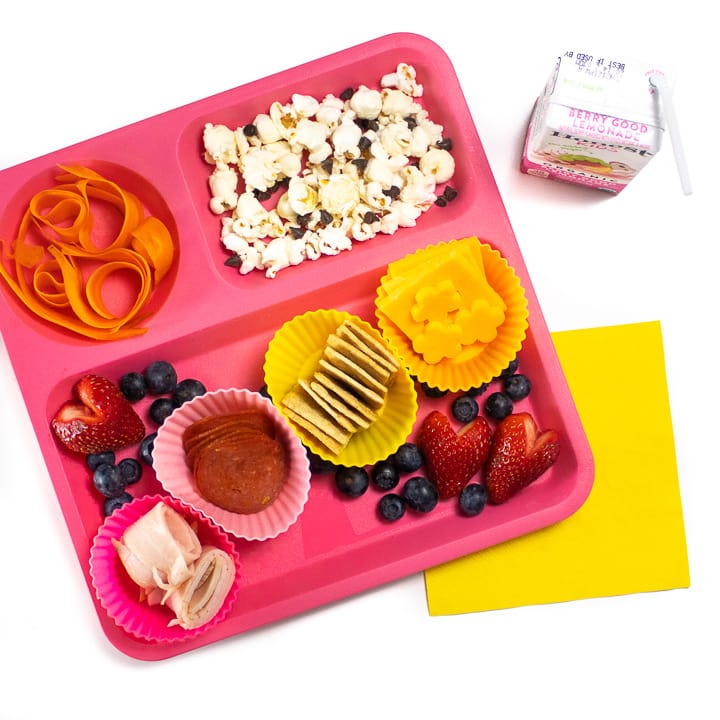 Pink plate that has a homemade punchable on it.
