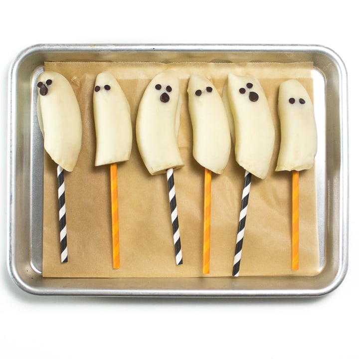 Tray of frozen ghost bananas for toddler and kids.