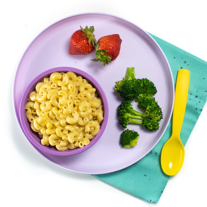 Kids dinner plate with instant pot Mac and cheese ready for a quick and easy family dinner.