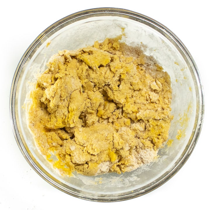 Wet and dry ingredients folded together to make biscuits for kids.