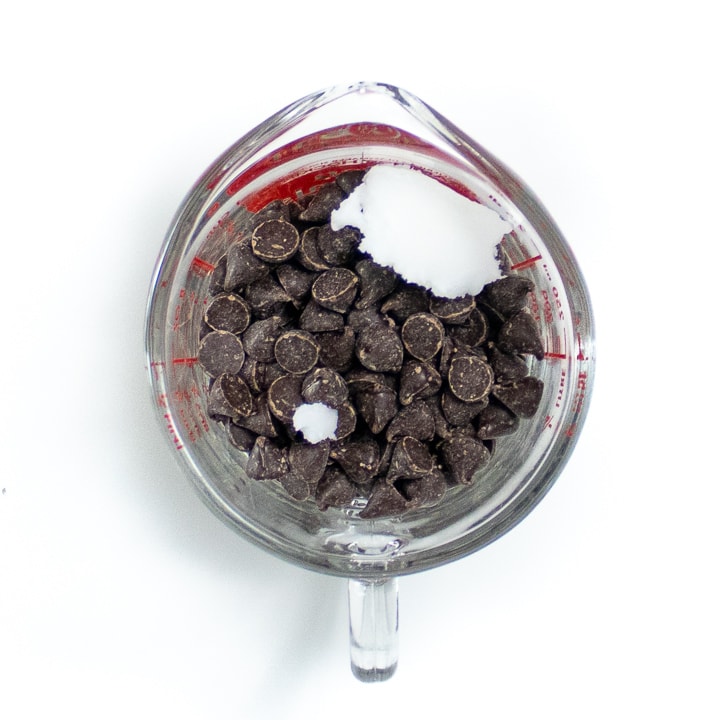 Chocolate chips and coconut oil ready to be melted down.