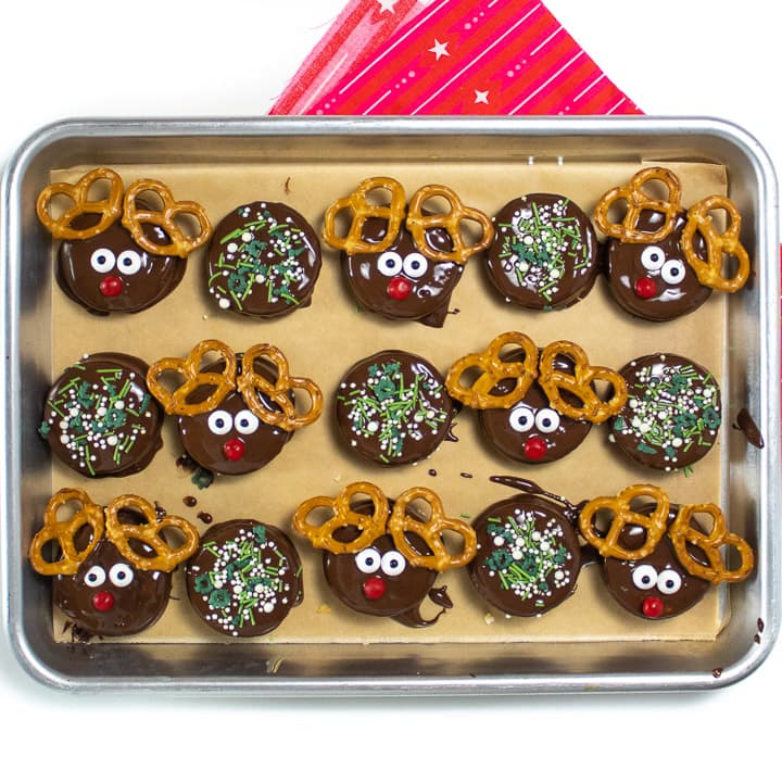 Plate full of reindeer and cracker cookies ready for the fridge to set.