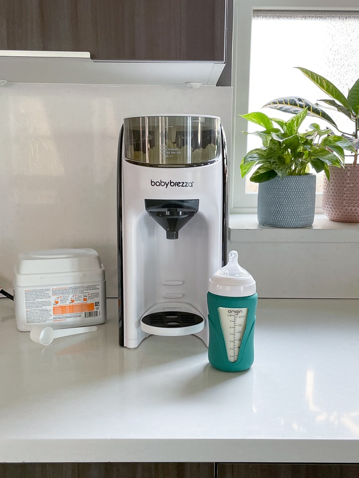 White counter with baby Brezza advanced formula pro machine and formula.