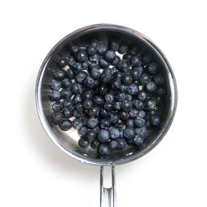 saucepan with blueberries inside.