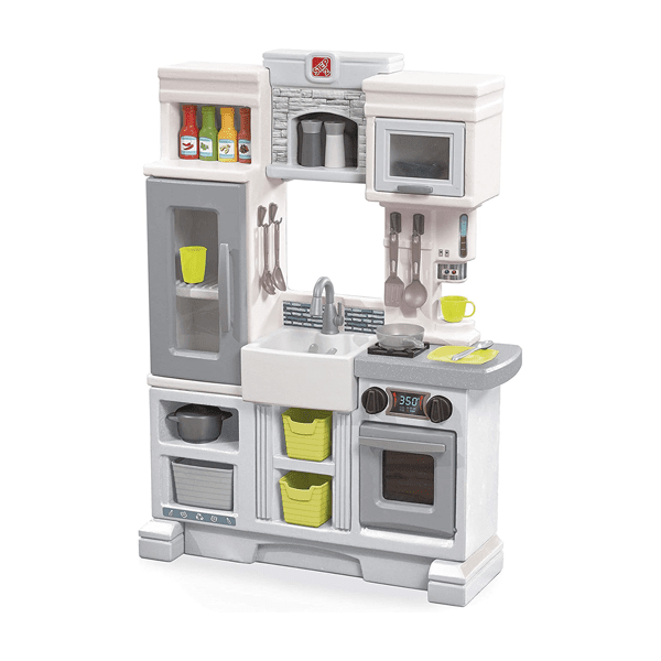 White and gray plastic play kitchen with green accents.